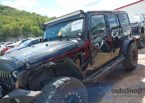 2011 Jeep Wrangler Unlimited Rubicon from USA, damaged, VIN 1J4BA6H18BL557594